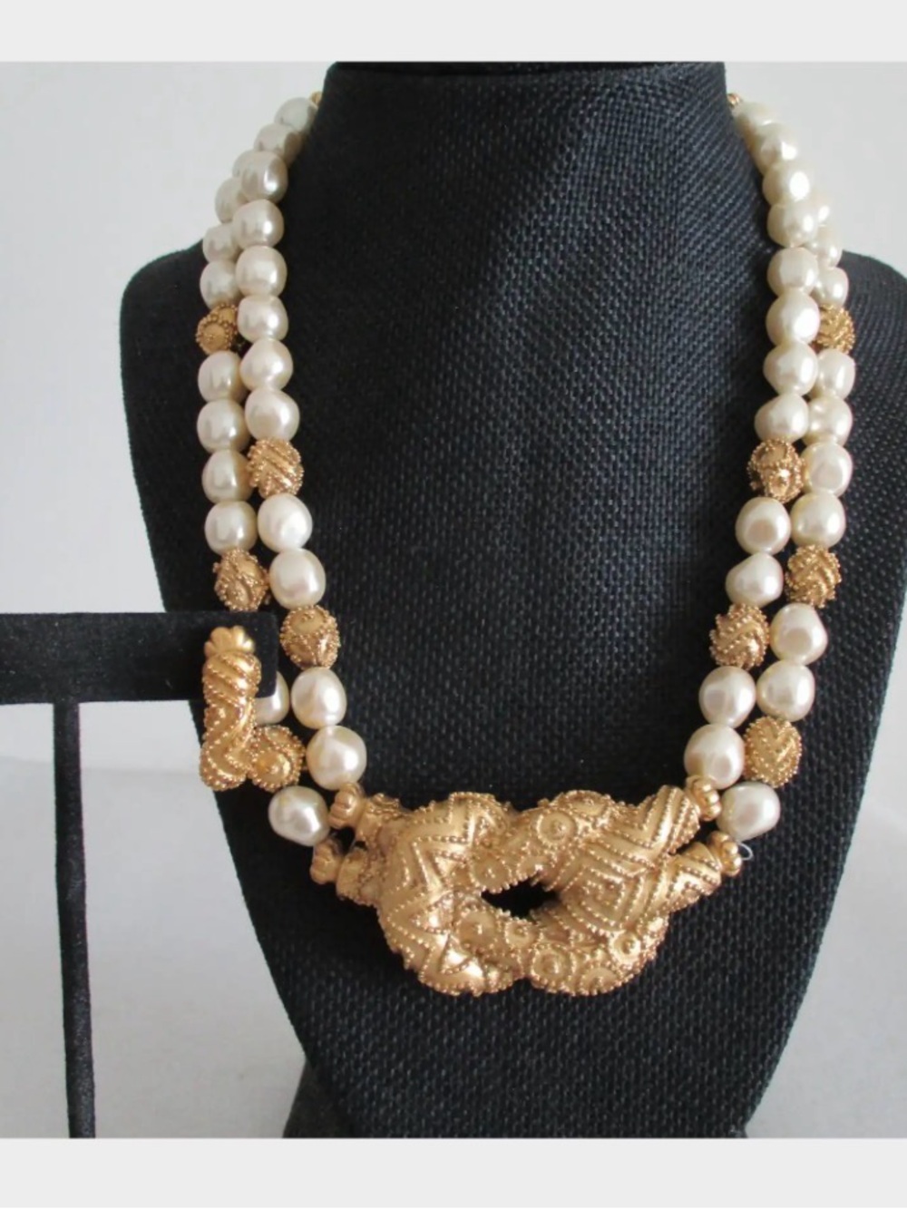 Etruscan style necklace, earrings set was designed by Mary McFadden